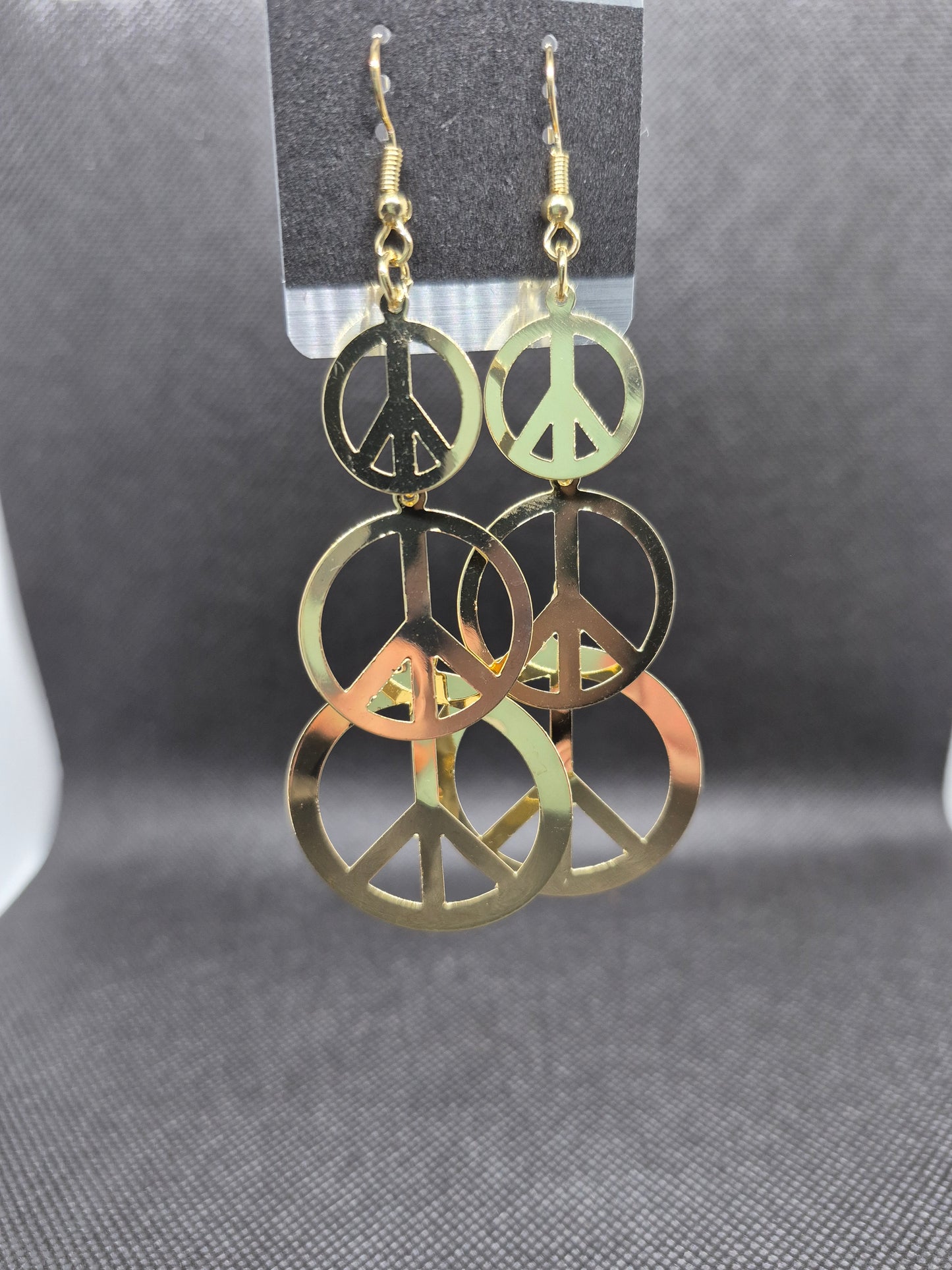 Peace sign dangle earrings